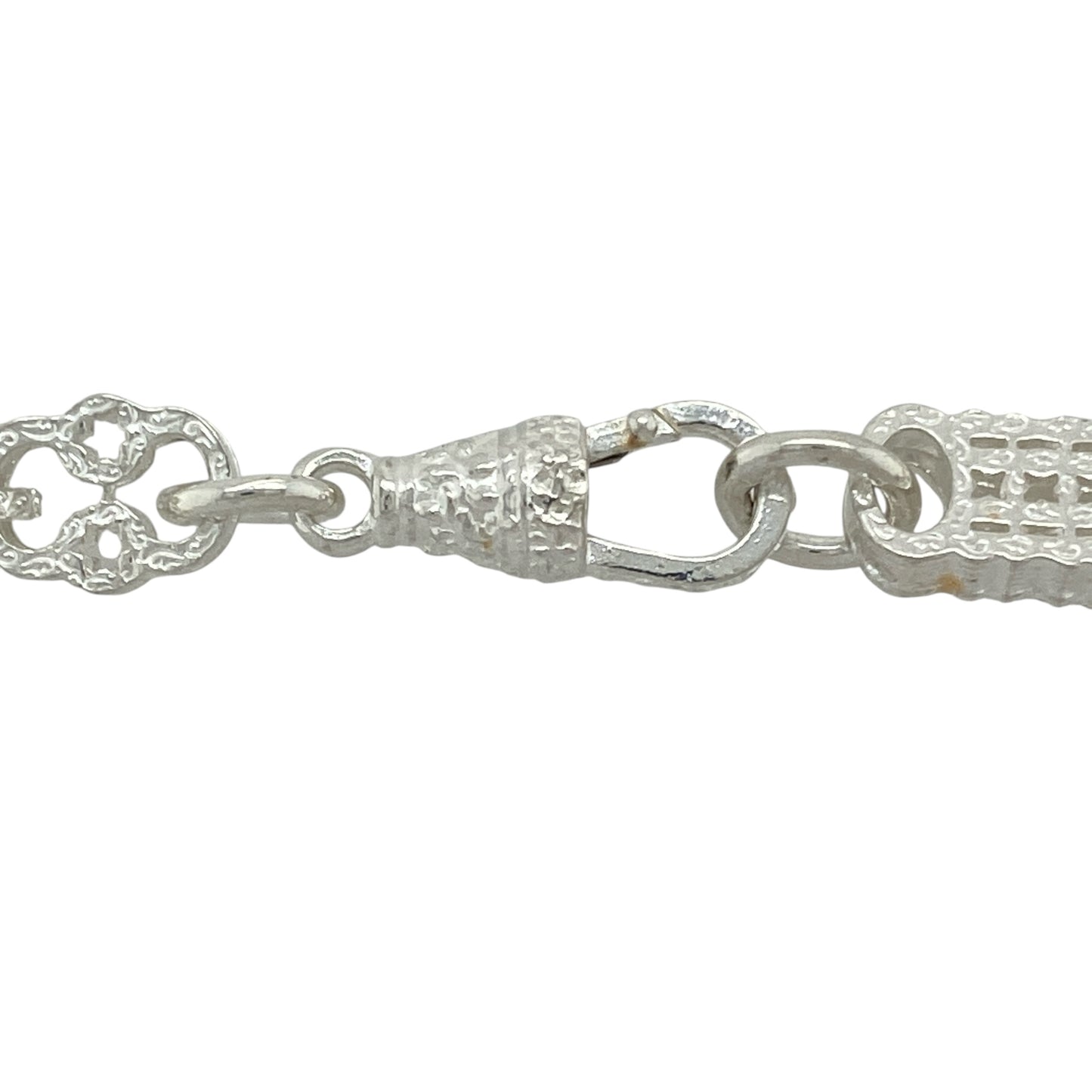 Bring striking detail and bold form to your jewellery collection with this new 925 silver 26" patterned star and bar chain—a standout piece combining geometric design with timeless silver appeal.

Design: Featuring 9mm wide alternating star and bar links with engraved patterning, this chain delivers strong visual contrast and unique structural character.
Material: Made from solid 925 sterling silver, the polished and textured finishes highlight the intricate design and add depth to each link.