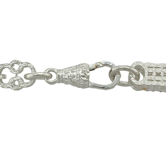 Bring striking detail and bold form to your jewellery collection with this new 925 silver 26" patterned star and bar chain—a standout piece combining geometric design with timeless silver appeal.

Design: Featuring 9mm wide alternating star and bar links with engraved patterning, this chain delivers strong visual contrast and unique structural character.
Material: Made from solid 925 sterling silver, the polished and textured finishes highlight the intricate design and add depth to each link.