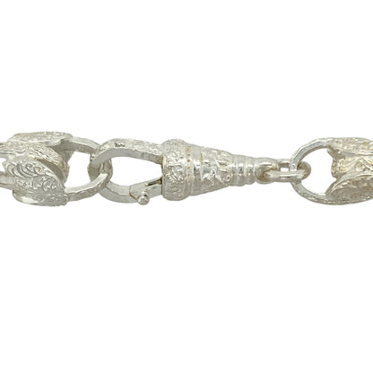 Bring floral-inspired boldness and intricate detail to your jewellery collection with this new 925 silver 24.5" patterned tulip link chain—a striking piece with elegant curves and commanding presence.

Design: Featuring 13mm wide tulip-shaped links with detailed patterning, this chain blends botanical elegance with strong structural design.
Material: Made from solid 925 sterling silver, the polished and engraved finishes highlight the natural contours and texture of each tulip-inspired link.
