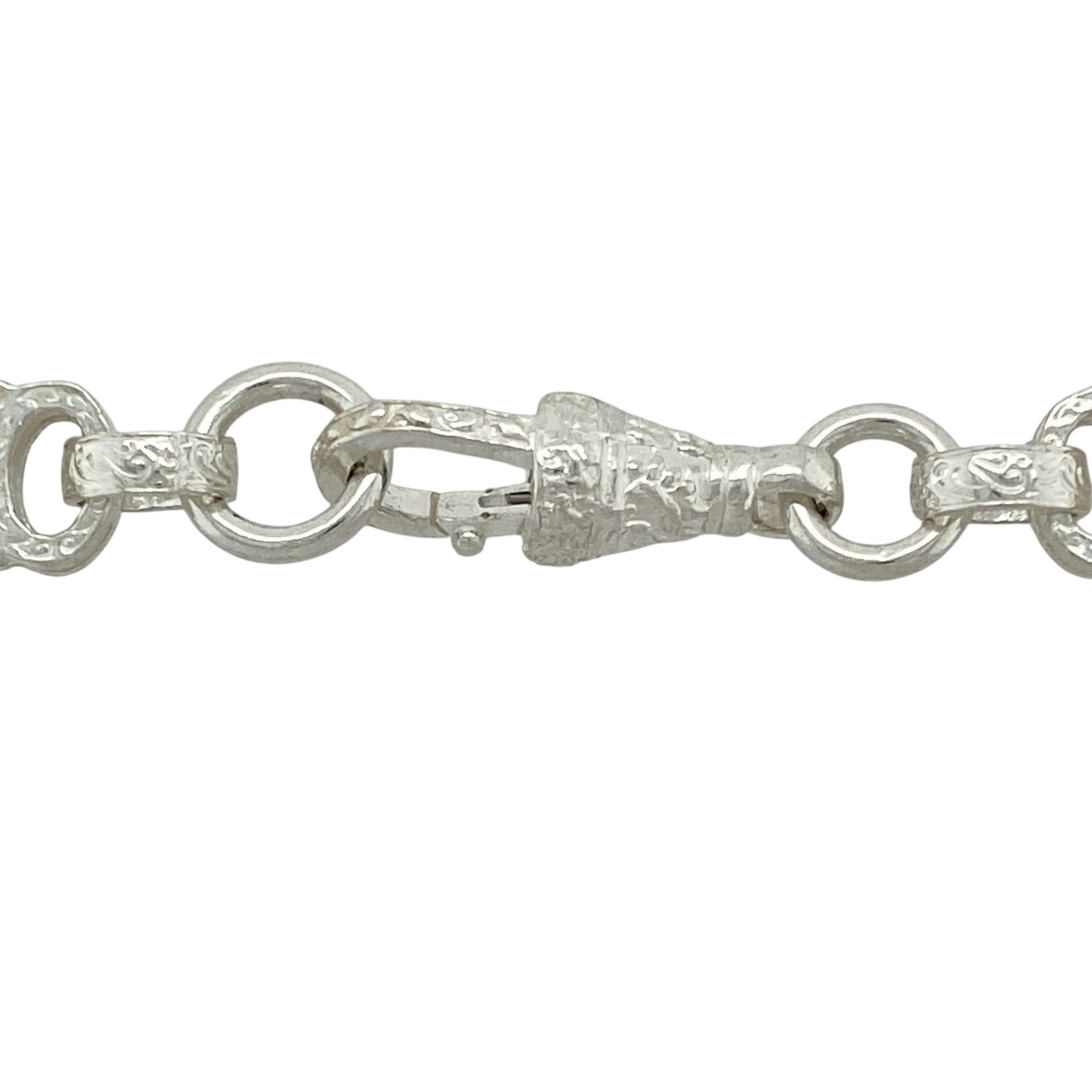 Bring bold symmetry and detailed craftsmanship to your jewellery collection with this new 925 silver 24" patterned star and bar chain—a striking piece with geometric flair and classic shine.

Design: Featuring 9mm wide alternating star and bar links with engraved patterning, this chain delivers a balanced and eye-catching look with unique structural appeal.
Material: Made from solid 925 sterling silver, the polished and textured finishes enhance the bold lines and intricate details of each link.
