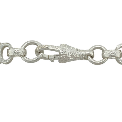 Bring bold symmetry and detailed craftsmanship to your jewellery collection with this new 925 silver 24" patterned star and bar chain—a striking piece with geometric flair and classic shine.

Design: Featuring 9mm wide alternating star and bar links with engraved patterning, this chain delivers a balanced and eye-catching look with unique structural appeal.
Material: Made from solid 925 sterling silver, the polished and textured finishes enhance the bold lines and intricate details of each link.
