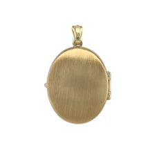 Load image into Gallery viewer, Bring heritage detail and meaningful style to your collection with this pre-owned 9ct yellow gold oval Celtic knot locket—a timeless piece with cultural charm and personal significance.

Design: This elegant oval locket features an intricate Celtic knot motif on the front, symbolising eternity, unity, and connection.
Material: Made from 9-carat yellow gold, the polished finish enhances the detailed design with warmth and shine.

