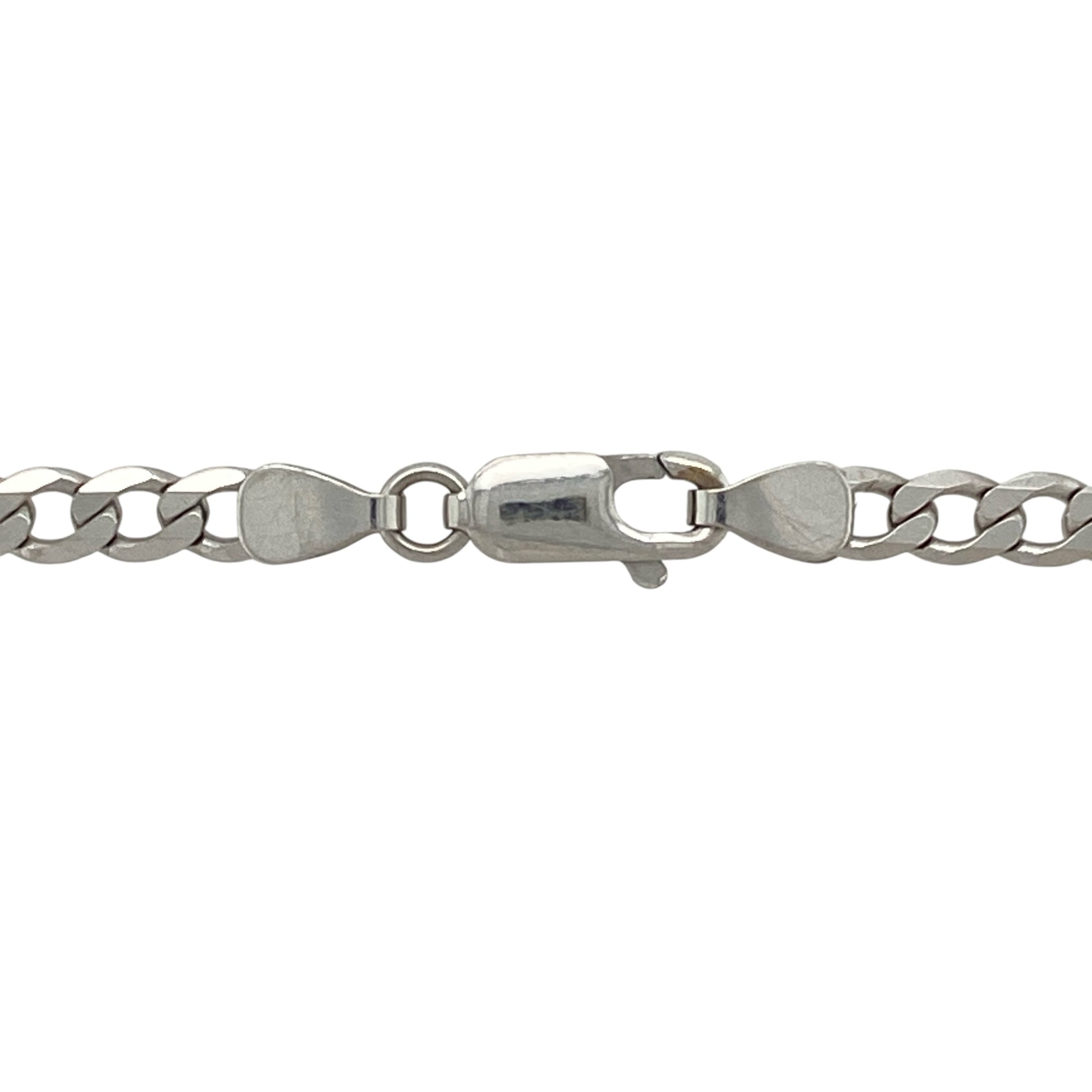 Bring bold elegance and timeless appeal to your collection with this pre-owned 9ct white gold curb chain—a classic piece with a sleek, polished finish.

Design: This 24" chain features 4mm wide curb links, offering a strong and structured look that suits both everyday wear and special occasions.
Material: Made from 9-carat white gold, the highly polished finish enhances the clean lines of the curb links with a cool, refined shine.

