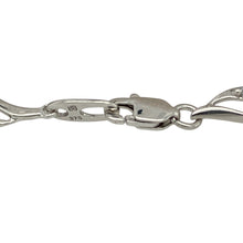 Load image into Gallery viewer, Add sparkle and sophistication to your wrist with this pre-owned 9ct white gold and cubic zirconia set curved link bracelet—a refined design that blends graceful movement with radiant detail.

Design: Featuring elegant 4mm wide curved links, each section is set with shimmering cubic zirconia to create a fluid, light-catching effect across the full 7.25&quot; length.
Material: Made from 9-carat white gold, the sleek polished finish enhances the brilliance of the stones and adds a cool, contemporary shine.

