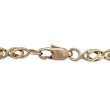 Load image into Gallery viewer, Add heritage-inspired detail and classic shine to your look with this pre-owned 9ct yellow gold 18&quot; Celtic link chain—a bold and elegant design with timeless character.

Design: Featuring 4mm wide interwoven Celtic-style links, the chain offers a distinctive pattern that blends traditional symbolism with refined structure.
Material: Made from 9-carat yellow gold, the polished finish enhances the depth of the intricate design and adds a rich, golden glow.

