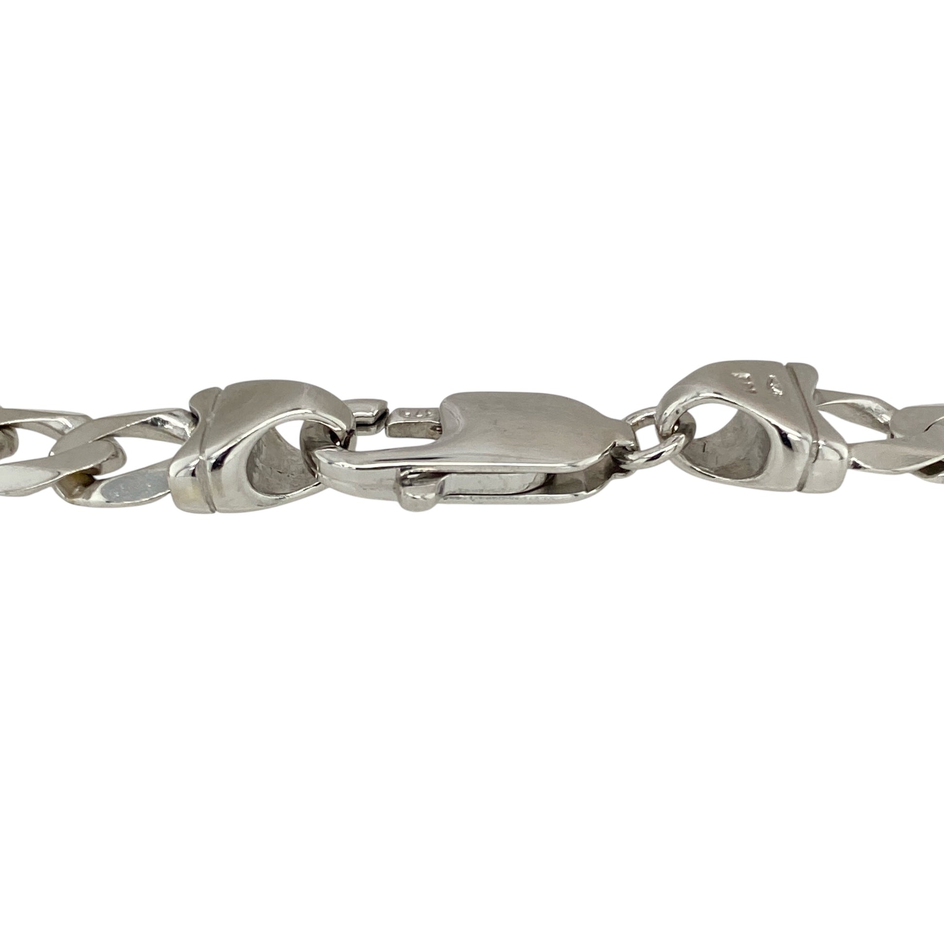 Add sleek sophistication and modern style to your collection with this pre-owned 9ct white gold curb bracelet—a bold yet versatile piece that offers timeless appeal, perfect for everyday wear or special occasions.

Design: This 8.25" bracelet features classic curb links with a 7mm width, creating a strong and polished look that makes a subtle statement on the wrist.
Material: Made from 9-carat white gold, the cool, bright tone enhances the clean, contemporary feel of the curb design 