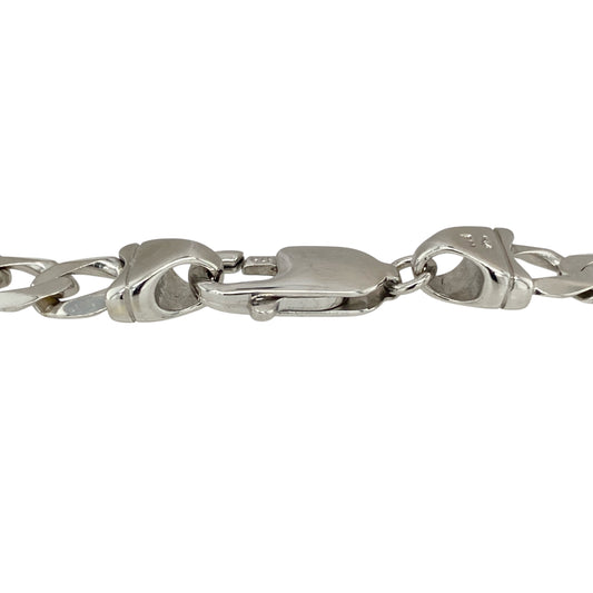 Add sleek sophistication and modern style to your collection with this pre-owned 9ct white gold curb bracelet—a bold yet versatile piece that offers timeless appeal, perfect for everyday wear or special occasions.

Design: This 8.25" bracelet features classic curb links with a 7mm width, creating a strong and polished look that makes a subtle statement on the wrist.
Material: Made from 9-carat white gold, the cool, bright tone enhances the clean, contemporary feel of the curb design 