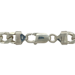 Add bold sophistication and timeless style to your collection with this pre-owned 925 silver 18" curb chain—a classic piece that makes a strong statement, perfect for everyday wear or elevating special occasion looks.

Design: This necklace features a substantial 7mm wide curb link design, offering a bold and polished appearance that stands out on the neckline.
Material: Made from 925 silver, the bright, high-shine finish enhances the strong, classic look and adds a refined, luxurious touch.
