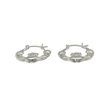 Load image into Gallery viewer, Bring meaningful symbolism and classic elegance to your collection with these new 925 silver round Claddagh creole earrings, offering a timeless design and graceful charm—perfect for adding a special touch to any look.

Design: The earrings feature a round creole style with a detailed Claddagh motif, measuring approximately 20mm in diameter. The Claddagh symbol represents love, loyalty, and friendship, adding sentimental value to their beautiful design.


