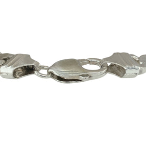 Bring classic strength and refined style to your collection with this pre-owned 925 silver 8.5" curb bracelet, offering a timeless blend of bold design and elegant simplicity—perfect for any occasion.

Design: The bracelet features a traditional curb link design with a 9mm width, creating a sleek and polished look that adds a confident touch to any outfit.
Material: Made from 925 silver, the polished finish enhances the bright, clean tone and highlights the smooth, interlocking links beautifully.
