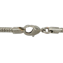 Load image into Gallery viewer, Bring sleek sophistication and timeless shine to your collection with this pre-owned 925 silver 18&quot; snake chain, offering a striking blend of smooth design and elegant presence—perfect for elevating any look.

Design: The chain features a classic snake link design with a 4mm width, creating a fluid, polished look that beautifully catches and reflects the light.
Material: Made from 925 silver, the high-polish finish enhances the bright, clean tone and highlights the chain’s seamless, flexible structure.

