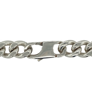 Bring bold sophistication and striking presence to your collection with this pre-owned 925 silver 18" curb chain, offering a powerful blend of classic design and substantial weight—perfect for making an unmistakable statement.

Design: The chain features a traditional curb link design with an impressive 11mm width, creating a strong, polished look that demands attention and adds confident style to any outfit.
