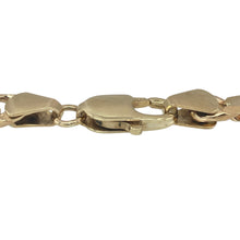 Load image into Gallery viewer, Bring bold sophistication and timeless style to your collection with this pre-owned 9ct yellow gold Figaro bracelet, offering a classic link design and substantial presence — perfect for everyday luxury or standout occasion wear.

Design: This traditional 9&quot; Figaro bracelet features alternating long and short links with a generous 7mm width, creating a distinctive and elegant look that never goes out of style.

