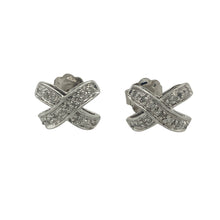 Load image into Gallery viewer, Bring subtle sparkle and romantic charm to your collection with these pre-owned 9ct white gold and diamond set kiss stud earrings—a delicate design with timeless elegance and symbolic style.

Design: The earrings feature an elegant &quot;X&quot; kiss shape, each set with sparkling diamonds for a refined, love-inspired look that’s perfect for any occasion.
Material: Made from 9-carat white gold, the polished finish enhances the brilliance of the diamonds and offers a cool, modern shine.

