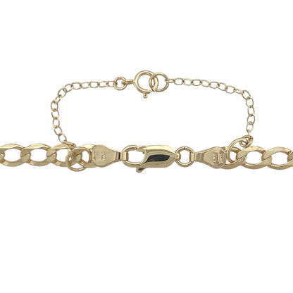Add timeless edge and bold polish to your look with this pre-owned 9ct yellow gold curb chain, featuring a classic profile and secure finish—ideal for layering or solo wear.

Design: This 18-inch curb chain features flat, closely interlocked links with a bold 5mm width, creating a sleek and structured silhouette that catches the light with every movement.
Material: Made from 9-carat yellow gold, the chain delivers a rich tone and lasting shine, pairing effortlessly with both casual and formal pieces.

