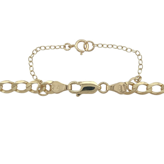 Add timeless edge and bold polish to your look with this pre-owned 9ct yellow gold curb chain, featuring a classic profile and secure finish—ideal for layering or solo wear.

Design: This 18-inch curb chain features flat, closely interlocked links with a bold 5mm width, creating a sleek and structured silhouette that catches the light with every movement.
Material: Made from 9-carat yellow gold, the chain delivers a rich tone and lasting shine, pairing effortlessly with both casual and formal pieces.
