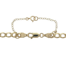Load image into Gallery viewer, Add timeless edge and bold polish to your look with this pre-owned 9ct yellow gold curb chain, featuring a classic profile and secure finish—ideal for layering or solo wear.

Design: This 18-inch curb chain features flat, closely interlocked links with a bold 5mm width, creating a sleek and structured silhouette that catches the light with every movement.
Material: Made from 9-carat yellow gold, the chain delivers a rich tone and lasting shine, pairing effortlessly with both casual and formal pieces.

