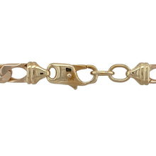 Load image into Gallery viewer, Add rich tone and classic design to your collection with this pre-owned 9ct rose gold curb chain, finished with a yellow gold clasp—bold, timeless, and full of character.

Design: This 20-inch chain features 5mm wide flat curb links in warm rose gold, offering a traditional, structured look with a subtle modern twist.
Material: Made from 9-carat rose gold with a contrasting yellow gold clasp, the polished finish highlights the depth of colour and craftsmanship.

