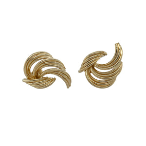 Stylish and sculptural, these pre-owned 9ct yellow gold swirl stud earrings bring movement and texture to a classic design—perfect for adding a touch of sophistication to any outfit.

Design: Each earring features a layered swirl design made up of multiple gold strands, creating a dynamic and dimensional look with a polished finish.
Material: Made from 9-carat yellow gold, the bright, high-shine finish enhances the flowing lines of the swirl motif.
