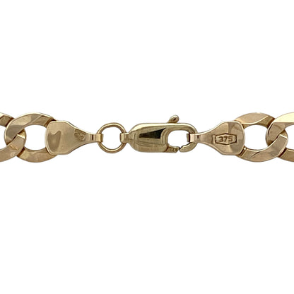 Strong and timeless, this pre-owned 9ct yellow gold curb chain features bold links and a classic finish—perfect for everyday wear or standout styling.

Design: The chain measures 20" in length with 7mm wide flat curb links, offering a sleek, masculine profile with smooth movement and a clean, uniform look.
Material: Made from 9-carat yellow gold, the polished finish enhances the bold link design with a warm, lustrous shine.
