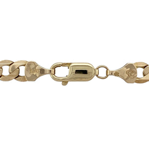 Classic and substantial, this pre-owned 9ct yellow gold curb chain offers timeless style with a bold edge—perfect for standout everyday wear or layering with statement pieces.

Design: The chain features a 20" length with 6mm wide flat curb links, creating a sleek, interlocking profile that lies smoothly against the neckline.
Material: Made from 9-carat yellow gold, the polished finish brings out the rich tone and enhances the strong, traditional link style.
