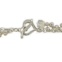 Load image into Gallery viewer, Bring sculptural elegance and statement style to your jewellery collection with this pre-owned 925 silver Dower &amp; Hall ball drop necklace—perfect for bold occasion wear or elevated everyday looks.

Design: This necklace features a series of polished silver ball elements arranged in a graduated drop style, creating fluid movement and a contemporary silhouette.
Material: Made from solid 925 sterling silver, the smooth high-shine finish enhances the modern design with a luxurious feel.

