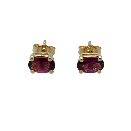 Bring vibrant colour and classic elegance to your jewellery collection with these pre-owned 9ct yellow gold stud earrings, featuring rich purple stones in a timeless oval cut—perfect for everyday wear or subtle evening sparkle.

Design: Each earring features a 6mm by 4mm oval-cut purple stone, offering a refined pop of colour in a clean, understated setting.
Material: Made from 9-carat yellow gold, the polished finish provides a warm contrast to the vivid tone of the stones.

