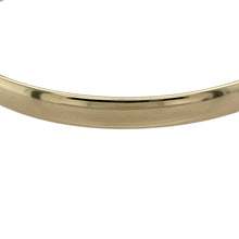 Load image into Gallery viewer, Bring timeless simplicity and enduring quality to your jewellery collection with this pre-owned 9ct yellow gold solid plain bangle—perfect for both everyday wear and special occasions.

Design: The bangle features a classic 5mm wide plain design, offering a sleek and versatile look that complements any style.
Material: Made from solid 9-carat yellow gold, the polished finish enhances the warm golden tone and smooth surface.

