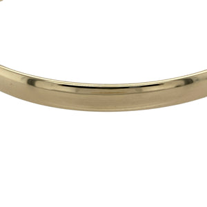 Bring timeless simplicity and enduring quality to your jewellery collection with this pre-owned 9ct yellow gold solid plain bangle—perfect for both everyday wear and special occasions.

Design: The bangle features a classic 5mm wide plain design, offering a sleek and versatile look that complements any style.
Material: Made from solid 9-carat yellow gold, the polished finish enhances the warm golden tone and smooth surface.
