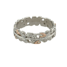Load image into Gallery viewer, Bring elegant symbolism and timeless style to your jewellery collection with this pre-owned 925 silver Clogau Tree of Life band ring, detailed with 9ct rose gold—perfect for meaningful everyday wear.

Design: The 5mm wide band features the iconic Tree of Life motif, with flowing vines in polished 9ct rose gold woven into the design for a graceful and symbolic finish.

