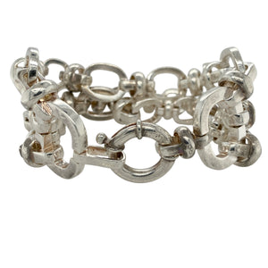  Bring bold design and striking presence to your collection with this pre-owned 925 silver three tiered oval link bracelet—perfect for making a confident statement.

Design: The bracelet features three layers of interlinked oval links with a total width of 38mm, creating a substantial and eye-catching look.
Material: Made from 925 sterling silver, the polished finish enhances the bright tone and smooth contours of each link.
