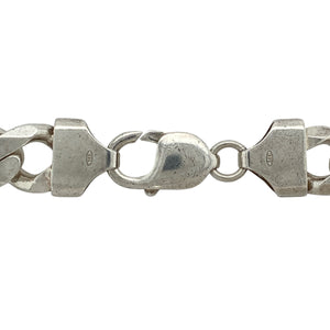 Bring bold presence and classic style to your collection with this pre-owned 925 silver curb chain—perfect for making a strong and timeless statement.

Design: The chain features 11mm wide curb links, offering a sleek and substantial look.
Material: Made from 925 sterling silver, the polished finish enhances the bright tone and smooth contours of each link.
Chain Detail: Measuring 18" in length, the chain sits comfortably and secures with a sturdy clasp for reliable wear.
