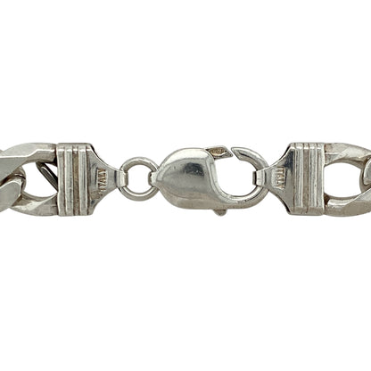 Bring bold presence and timeless appeal to your collection with this pre-owned 925 silver curb chain—perfect for making a confident statement.

Design: The chain features 11mm wide curb links, creating a strong and classic look.
Material: Made from 925 sterling silver, the polished finish enhances the bright tone and smooth profile of each link.
Chain Detail: Measuring 20" in length, the chain offers a comfortable drape and secures with a sturdy clasp for reliable wear.
