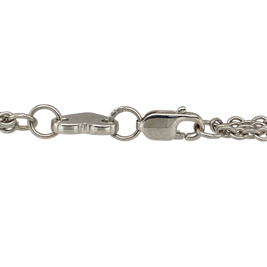 Bring symbolic elegance and sparkling detail to your collection with this pre-owned 9ct white gold diamond multi-strand bracelet—featuring four infinity heart charms for a meaningful and stylish look.

Design: The 7" bracelet is composed of multiple fine strands, each adorned with diamond-accented infinity heart charms that symbolise eternal love and connection.
Material: Made from 9-carat white gold, the polished finish enhances the brilliance of the diamonds and adds a sleek, modern touch.
