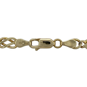 Bring bold design and golden heritage style to your collection with this pre-owned 9ct yellow gold Celtic link chain—a striking piece perfect for statement wear or pairing with a pendant.

Design: The 18" chain features interwoven Celtic-inspired links, measuring 5mm in width for a distinctive and textured look.
Material: Made from 9-carat yellow gold, the polished finish enhances the intricate link design and adds timeless appeal.
