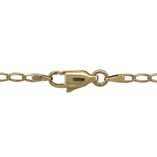 Bring classic simplicity and golden shine to your collection with this pre-owned 9ct yellow gold open curb chain—a versatile design perfect for everyday wear or pairing with a pendant.

Design: The 22" chain features open curb links, measuring 2mm in width for a fine and understated look.
Material: Made from 9-carat yellow gold, the polished finish enhances the smooth links and adds timeless appeal.
