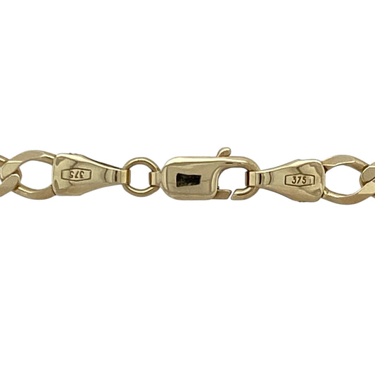 Bring classic strength and golden style to your collection with this pre-owned 9ct yellow gold curb chain—a timeless design with versatile presence, perfect for everyday wear.

Design: The 22" chain features traditional curb links, measuring 5mm in width for a bold yet balanced look.
Material: Made from 9-carat yellow gold, the polished finish enhances the smooth links and adds lasting appeal.
