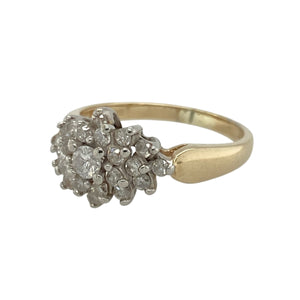 Bring brilliant sparkle and timeless elegance to your collection with this pre-owned 9ct yellow gold diamond cluster ring—a striking design with refined character.

Design: The ring features a 10mm high cluster front, set with approximately 0.50ct of diamond content in total for a bold and eye-catching look.
Material: Made from 9-carat yellow gold, the polished finish enhances the brilliance of the diamonds and adds classic appeal.
