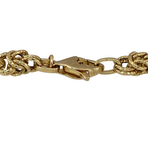 Bring elegant texture and timeless design to your collection with this pre-owned 9ct yellow gold bracelet, featuring a mix of long oval links and intricate Byzantine detail—perfect for adding sophistication to any look.

Design: The 8" bracelet combines elongated textured oval links with sections of classic Byzantine style, creating a unique and eye-catching pattern.
Material: Made from 9-carat yellow gold, the polished finish enhances the detailed textures and gives the bracelet a refined glow.
