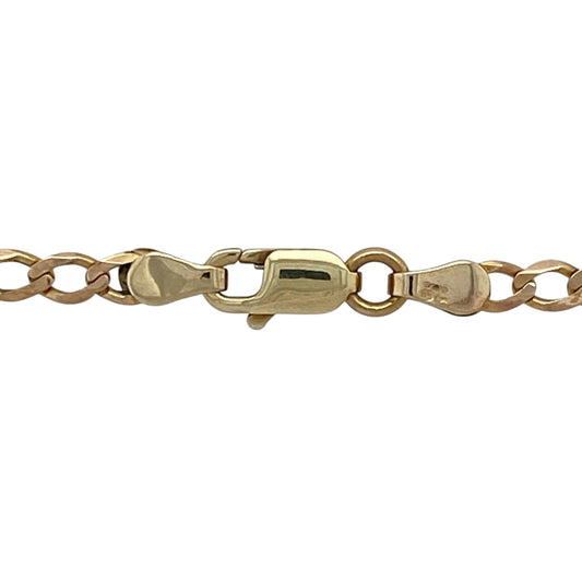 Bring classic style and everyday versatility to your collection with this pre-owned 9ct yellow gold curb chain, offering timeless appeal and a polished finish—perfect worn alone or paired with a pendant.

Design: The chain measures 18" in length with a 3mm link width, creating a sleek and balanced profile.
Material: Made from 9-carat yellow gold, the polished finish enhances the chain’s smooth and enduring shine.
