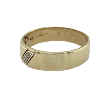 Load image into Gallery viewer, Bring meaningful detail and timeless style to your collection with this pre-owned 9ct yellow gold diamond band ring, combining classic design with a romantic message—perfect as a symbolic gift or everyday keepsake.

Design: The band measures 6mm wide and features four small diamonds set at the front, adding subtle sparkle to the polished gold.
Material: Made from 9-carat yellow gold, the polished finish provides a warm backdrop that enhances the diamonds’ brilliance.

