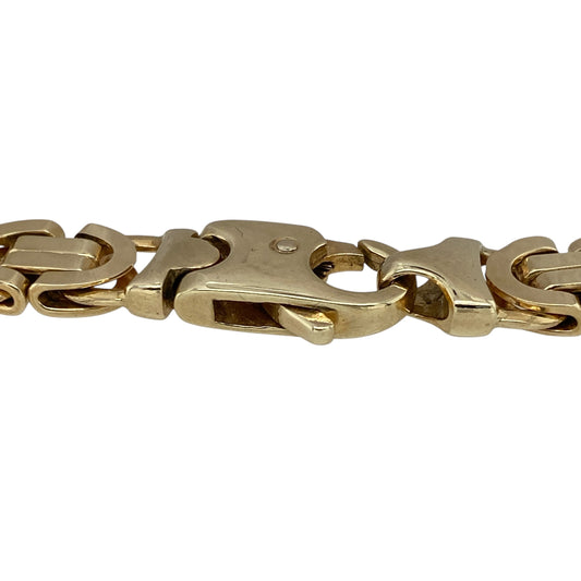 Bring bold design and timeless craftsmanship to your collection with this pre-owned 9ct yellow gold Byzantine style bracelet, offering a substantial feel with intricate detail—perfect as a statement piece or luxury everyday accessory.

Design: The bracelet measures 8" in length with a 9mm link width, showcasing the distinctive Byzantine link style with its intricate interwoven pattern.
