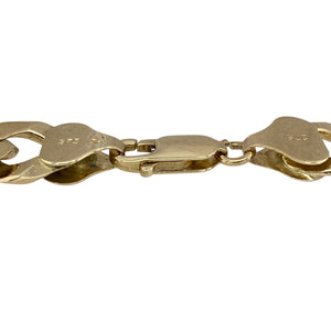 Bring bold style and timeless strength to your collection with this pre-owned 9ct yellow gold curb bracelet, offering a heavyweight design with classic appeal—perfect as a standout statement or luxury everyday accessory.

Design: The bracelet measures 8.5" in length with a 12mm link width, creating a wide and powerful profile in a traditional curb link style.
Material: Made from solid 9-carat yellow gold, the polished finish enhances the smooth links with a rich golden shine.
