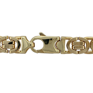 Bring bold luxury and intricate craftsmanship to your collection with this pre-owned 9ct yellow gold Byzantine style chain, offering a substantial weight with timeless elegance—perfect as a standout statement piece.

Design: The chain measures 22" in length with a 9mm link width, showcasing the distinctive interwoven Byzantine link pattern for depth and texture.
Material: Made from solid 9-carat yellow gold, the polished finish enhances the complex design with a rich golden shine.
