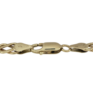 Celebrate tradition and style with this pre-owned 9ct yellow gold Celtic knot bracelet, a meaningful design with timeless appeal—perfect for everyday wear or special occasions.

Design: The bracelet features interlinked Celtic knot motifs, each measuring 7mm in width, symbolising eternity and unity with intricate detail.
Material: Made from 9-carat yellow gold, the polished finish enhances the warm tone and lasting shine.
