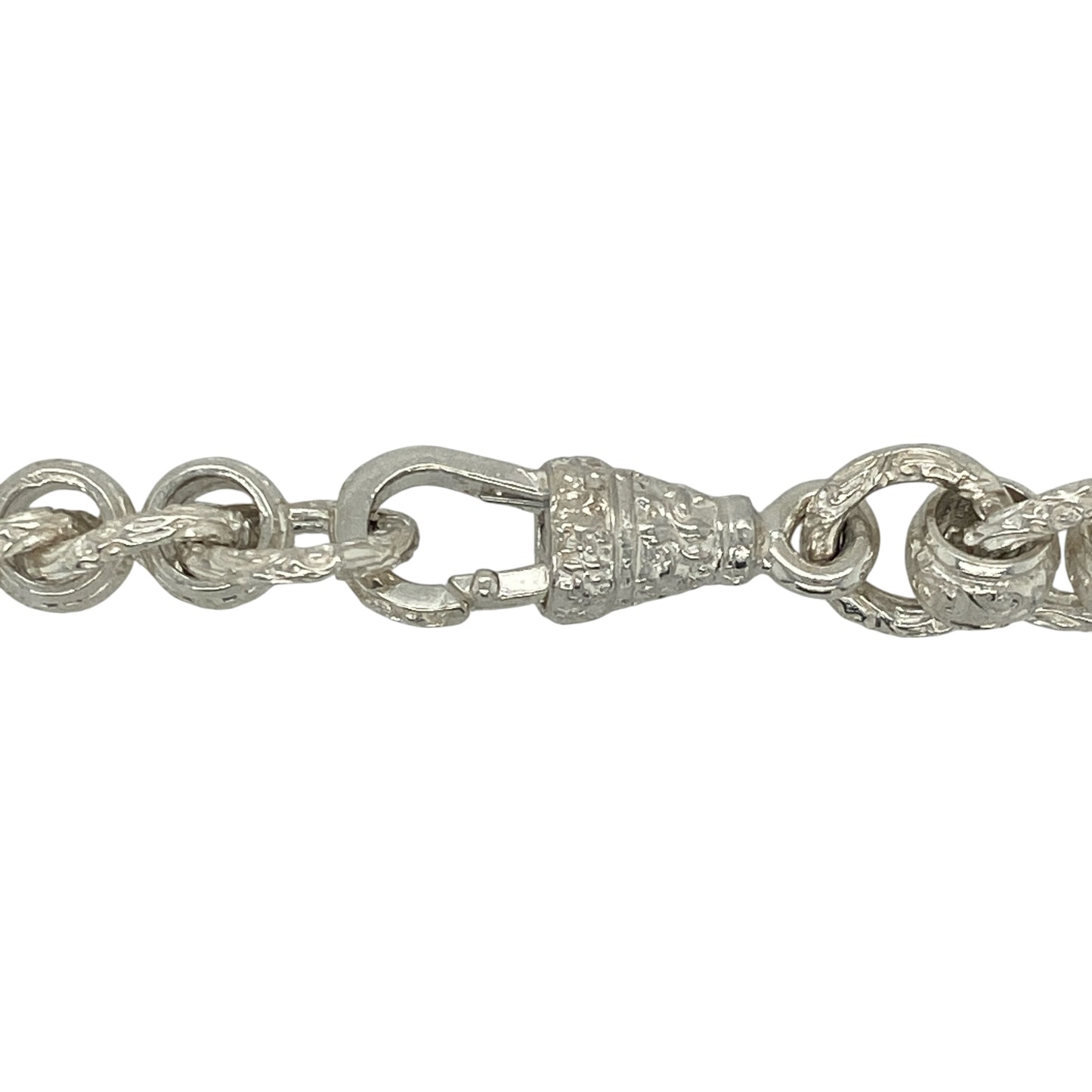 Command attention with this new 925 solid silver rollerball chain, a heavyweight design with bold patterned links—perfect for standout style and statement wear.

Design: The chain features large rollerball-style links, each measuring 11mm in width, with a patterned finish that adds texture and detail.
Material: Made from solid 925 sterling silver, the polished surface ensures durability and lasting shine.
