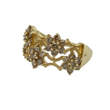 Load image into Gallery viewer, Bring unique sparkle and intricate detail to your collection with this pre-owned 9ct yellow gold champagne and chocolate diamond flower band ring, a striking piece with warm tones and timeless elegance.

Design: The ring showcases five flower-shaped diamond clusters across the front of the band, set with champagne and chocolate-coloured diamonds for a distinctive look.
