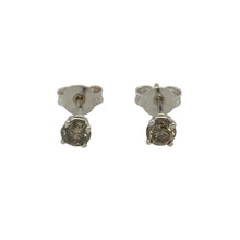 Load image into Gallery viewer, Bring unique sparkle to your collection with these pre-owned 18ct white gold chocolate diamond stud earrings, a refined twist on a timeless classic.

Design: Each stud features a brilliant-cut chocolate diamond of approximately 0.14ct, offering rich colour and elegant sparkle.
Material: Made in 18-carat white gold, the polished finish provides a bright backdrop that enhances the warmth of the diamonds.
