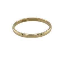 Load image into Gallery viewer, Celebrate classic simplicity with this pre-owned 9ct yellow gold wedding band ring, a timeless symbol of love and commitment.

Design: The ring features a traditional 2mm wide band with a smooth and polished finish for understated elegance.
Material: Made in 9-carat yellow gold, the warm tone offers a traditional choice with lasting appeal.
Ring Detail: Lightweight and versatile, this band is perfect as a wedding ring, stacking ring, or everyday piece.
