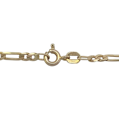 Bring classic design and versatile style to your collection with this pre-owned 9ct yellow gold Figaro chain, a timeless piece perfect for layering or wearing as a statement on its own.

Design: The chain measures 30" in length with 2mm wide Figaro links, featuring the traditional alternating pattern of long and short links for a distinctive look.
Material: Made from 9-carat yellow gold, the polished finish enhances the link design with a warm and refined glow.